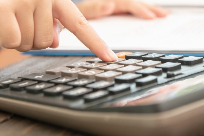 administrator-business-man-financial-inspector-secretary-making-report-calculating-balance.6a2a85